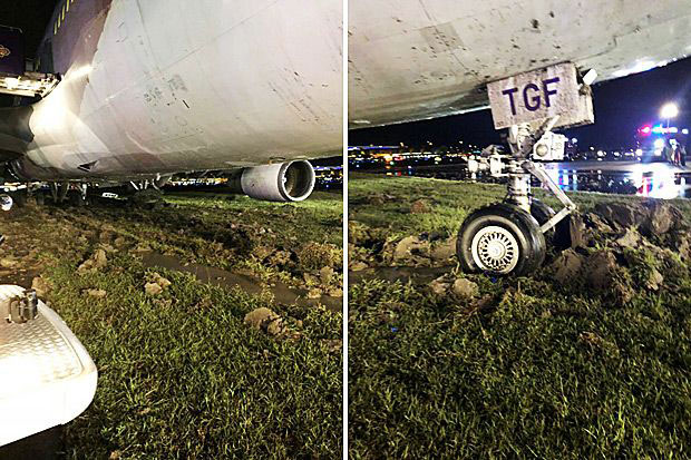 Behemoth Thai Airways B747-400 slides off runway upon landing